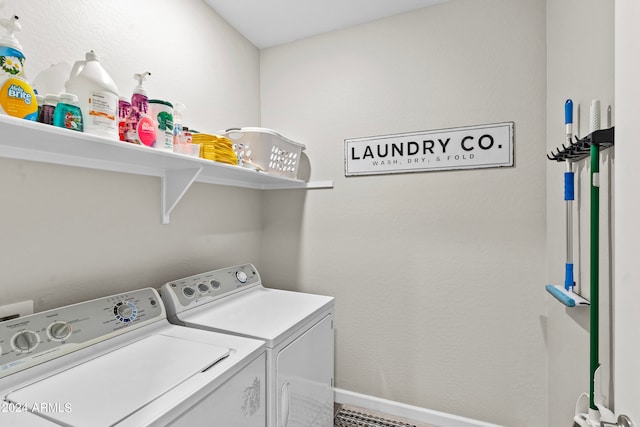 laundry room with washer and clothes dryer