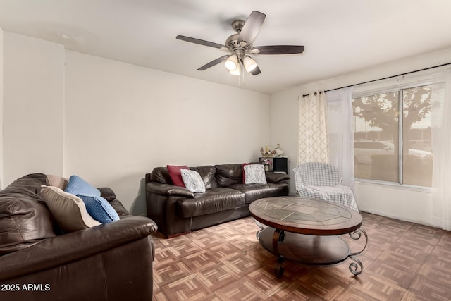 living room with parquet flooring and ceiling fan