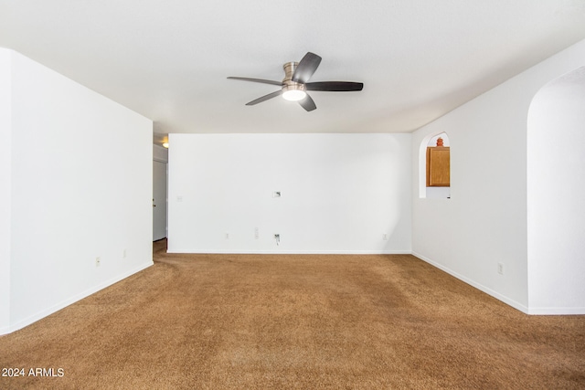 carpeted empty room with ceiling fan