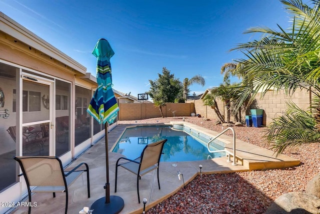 view of pool featuring a patio area