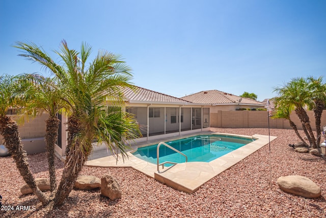 view of pool featuring a patio