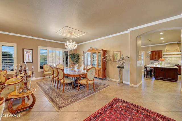 dining room with arched walkways, light tile patterned flooring, and a notable chandelier