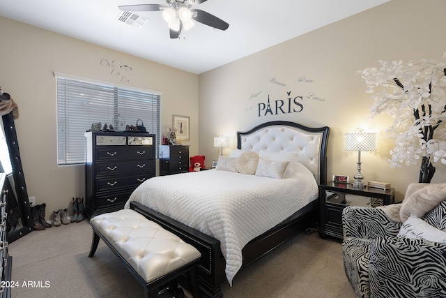 bedroom featuring light colored carpet and ceiling fan