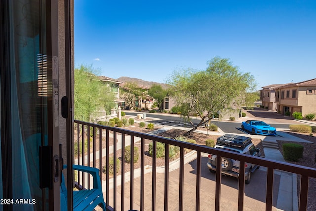 balcony featuring a mountain view