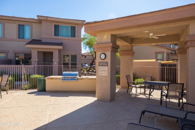 view of patio with a grill and ceiling fan