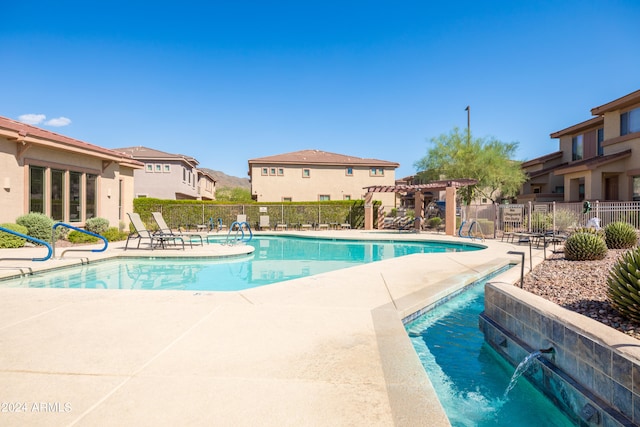 view of pool featuring a patio and a pergola