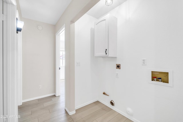 laundry area featuring washer hookup, hookup for a gas dryer, light wood-style floors, laundry area, and electric dryer hookup