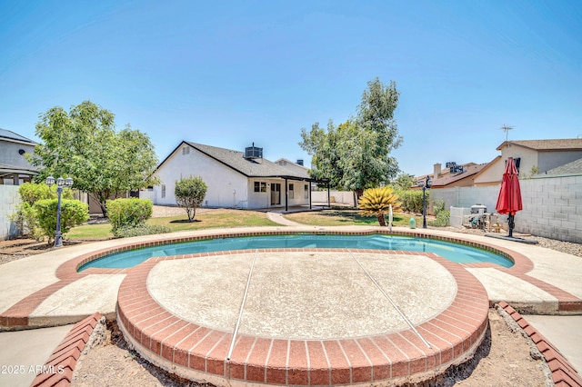 view of pool with a patio, a fenced backyard, and a fenced in pool
