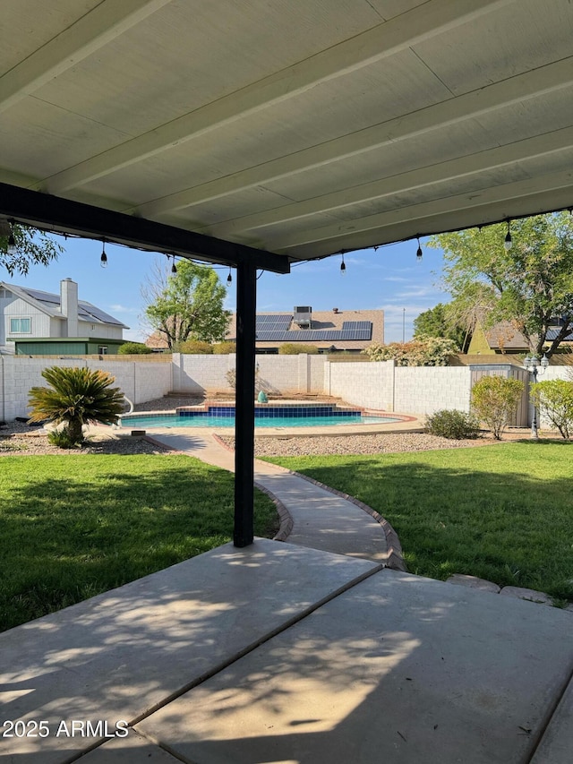 view of patio featuring a fenced backyard and a fenced in pool