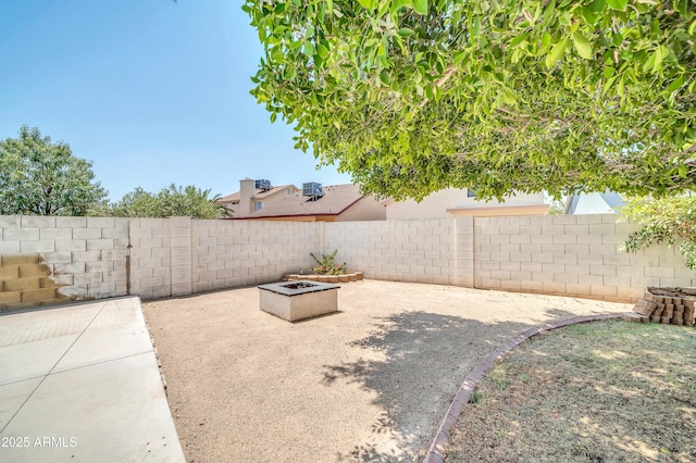 view of yard featuring a patio and a fenced backyard