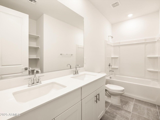 full bathroom with toilet, vanity, and bathtub / shower combination