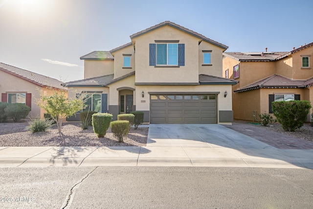 front of property featuring a garage