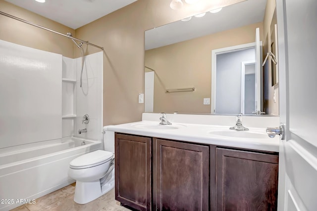 full bathroom featuring shower / tub combination, tile patterned floors, vanity, and toilet