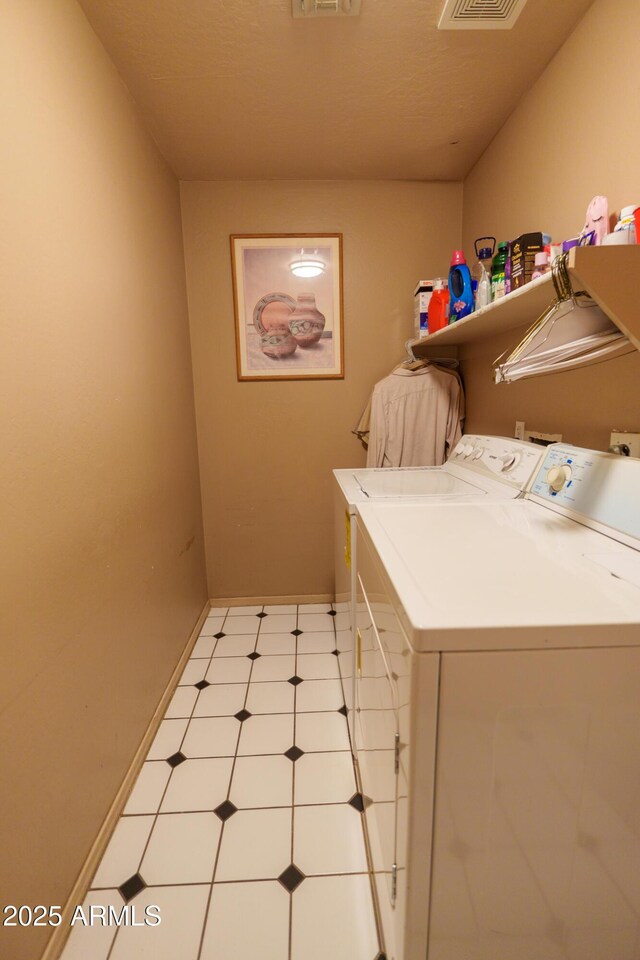 111 N Soho Pl, Chandler, AZ 85225 - laundry room with washer and dryer and light flooring