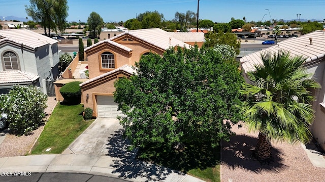 111 N Soho Pl, Chandler, AZ 85225 - view of front of property featuring driveway, an attached garage, and a residential view