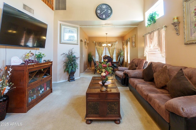 111 N Soho Pl, Chandler, AZ 85225 - living area featuring a chandelier, carpet flooring, and a towering ceiling