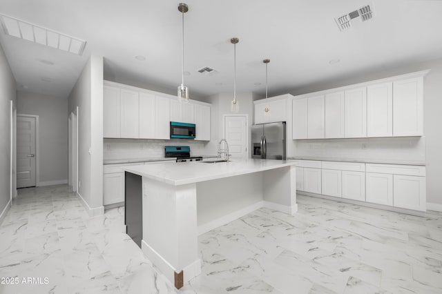 kitchen with marble finish floor, visible vents, appliances with stainless steel finishes, and a sink