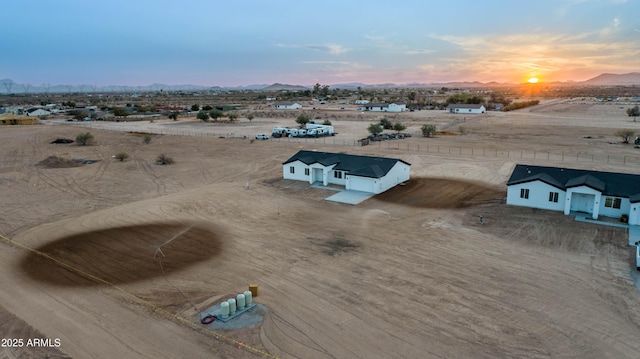 birds eye view of property featuring a mountain view