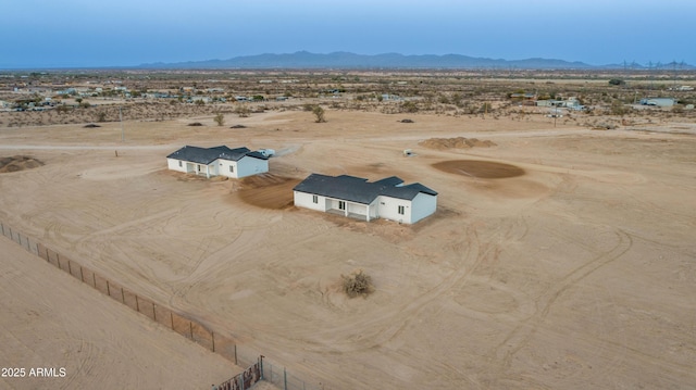 aerial view with a desert view and a mountain view