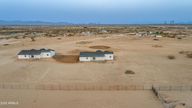 aerial view with view of desert and a mountain view