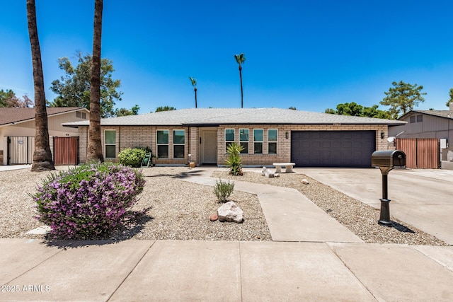 2062 S Emerson, Mesa, AZ 85210 - ranch-style house with a garage, brick siding, and concrete driveway