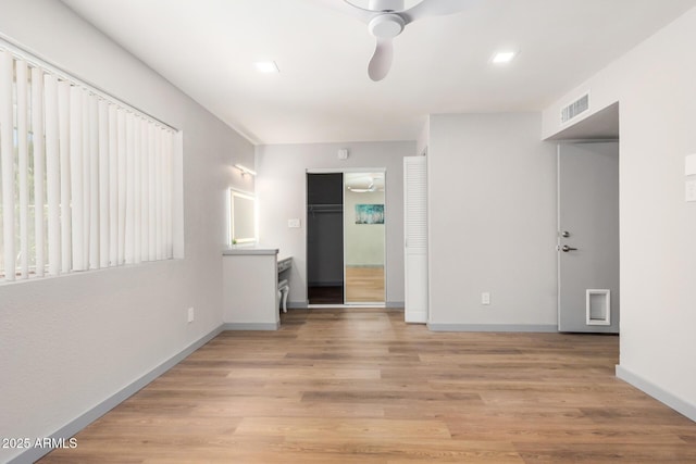 2062 S Emerson, Mesa, AZ 85210 - unfurnished living room with ceiling fan and light wood-type flooring