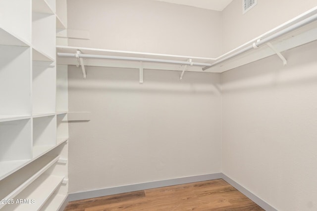 2062 S Emerson, Mesa, AZ 85210 - spacious closet featuring wood finished floors