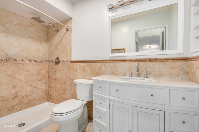 2062 S Emerson, Mesa, AZ 85210 - full bathroom with vanity, tiled shower, tile walls, and wainscoting