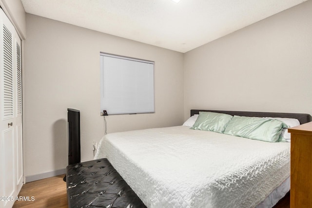 2062 S Emerson, Mesa, AZ 85210 - bedroom with wood finished floors and a closet