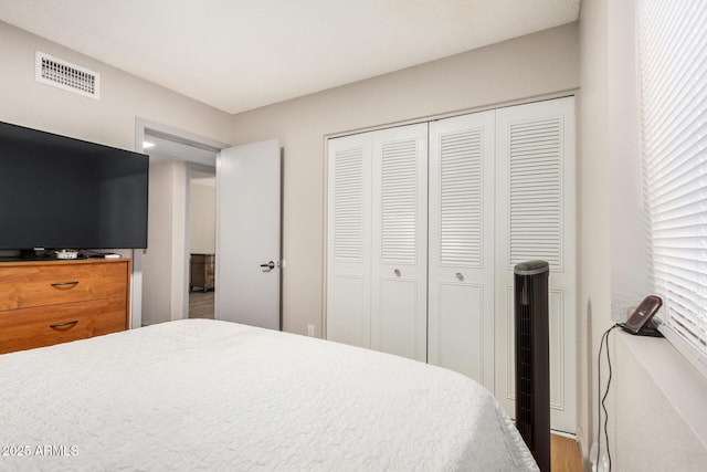 2062 S Emerson, Mesa, AZ 85210 - bedroom featuring a closet and wood finished floors