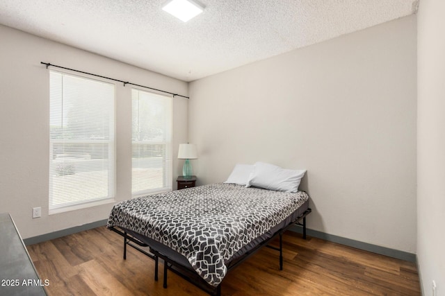 2062 S Emerson, Mesa, AZ 85210 - bedroom featuring wood finished floors and a textured ceiling