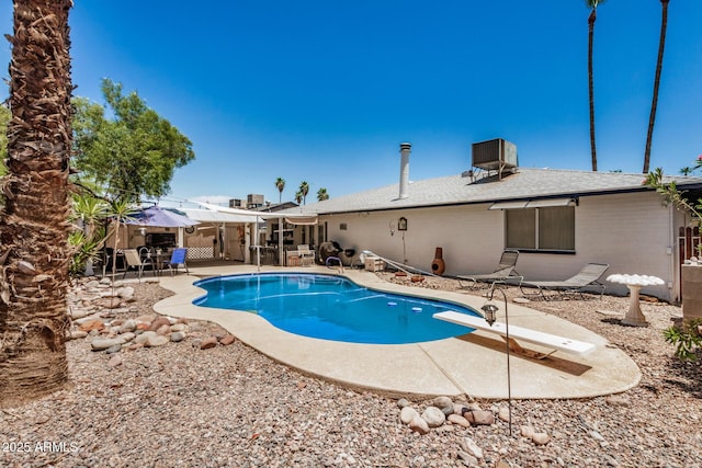 2062 S Emerson, Mesa, AZ 85210 - view of pool with a patio area and a diving board