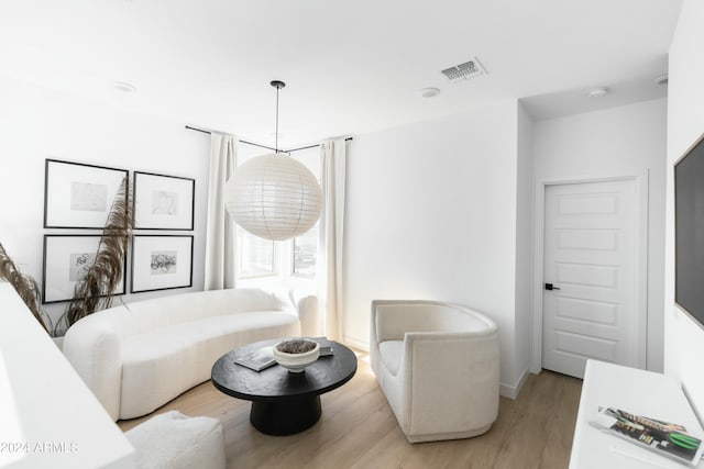 sitting room with light wood-type flooring