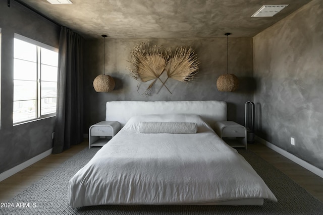 bedroom featuring hardwood / wood-style floors