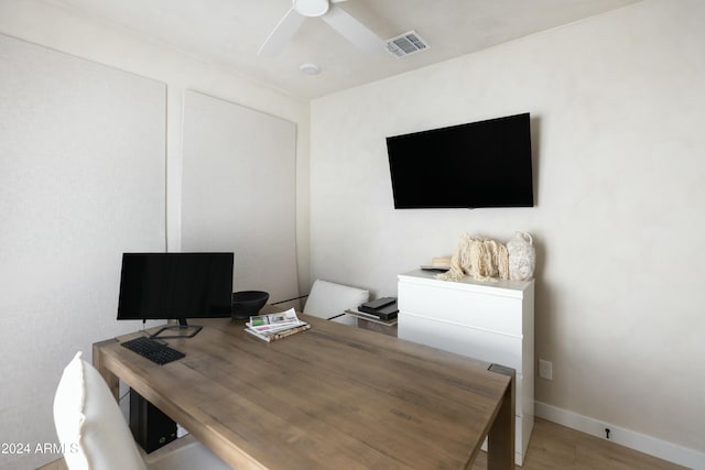 office area with ceiling fan and light hardwood / wood-style flooring