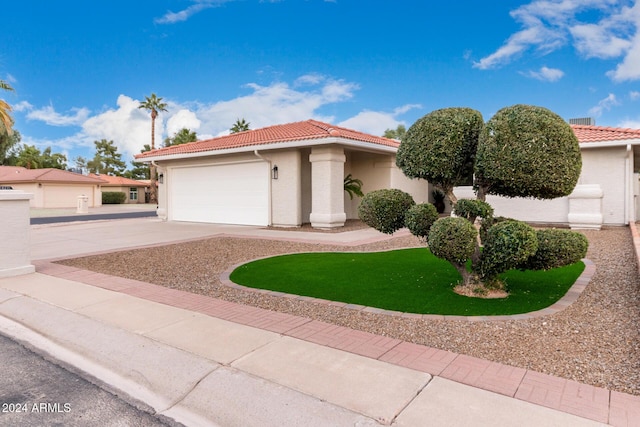 mediterranean / spanish-style house featuring a garage