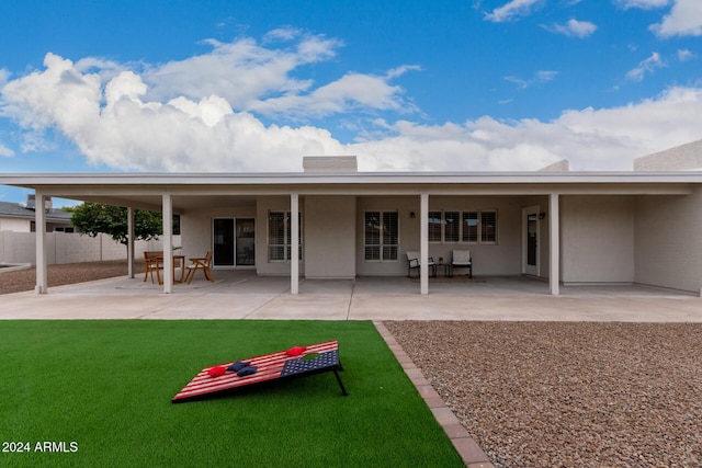 rear view of house featuring a patio