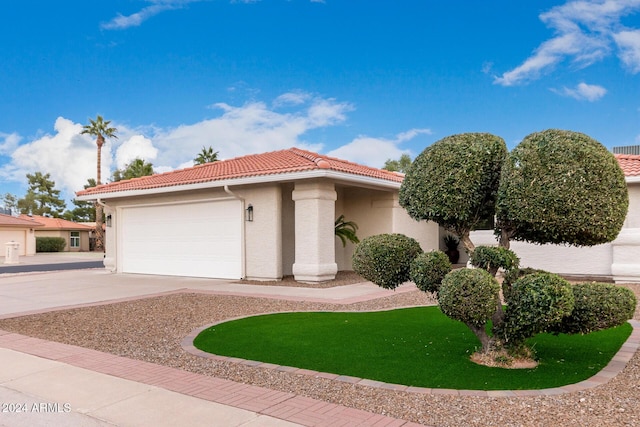 view of front of home with a garage