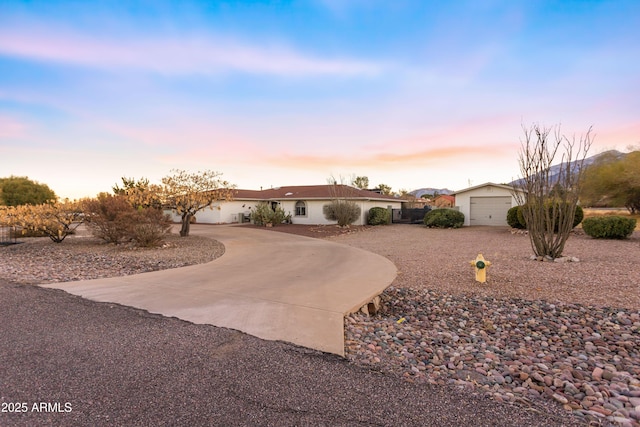 single story home with a garage