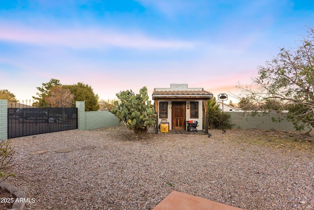 yard at dusk with an outdoor structure