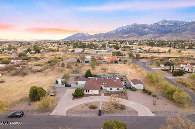 aerial view at dusk with a mountain view