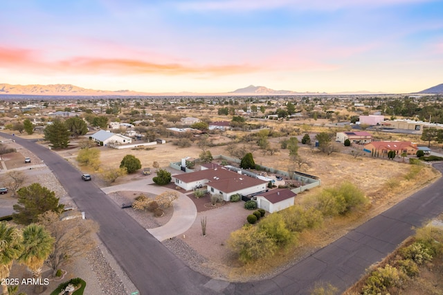 aerial view at dusk with a mountain view