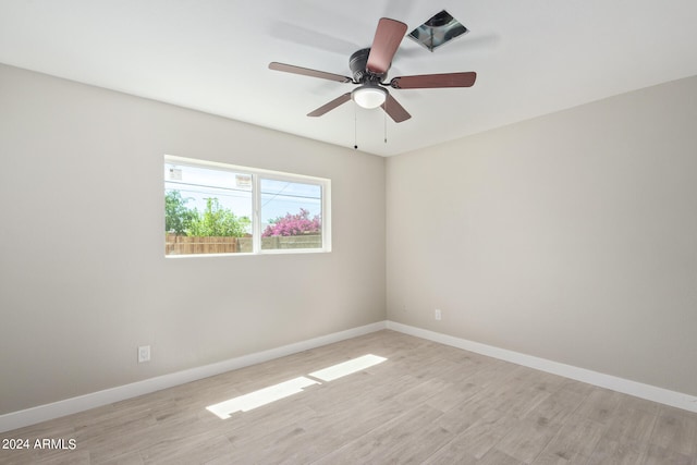 unfurnished room featuring light hardwood / wood-style floors and ceiling fan