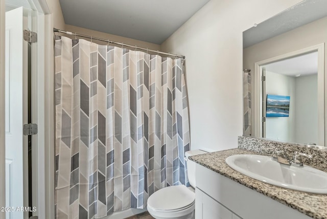 459 Brandeis Dr, Morristown, AZ 85342 - bathroom with a shower with shower curtain, toilet, and vanity