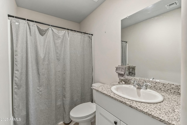 459 Brandeis Dr, Morristown, AZ 85342 - full bathroom with visible vents, vanity, a shower with shower curtain, and toilet