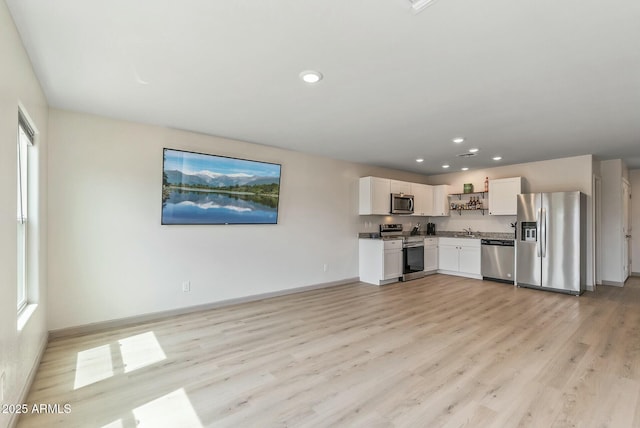 459 Brandeis Dr, Morristown, AZ 85342 - kitchen featuring baseboards, light wood-style floors, stainless steel appliances, and recessed lighting