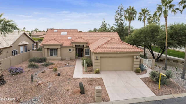 view of front of property with a garage