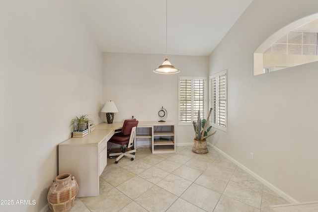 office space with light tile patterned floors