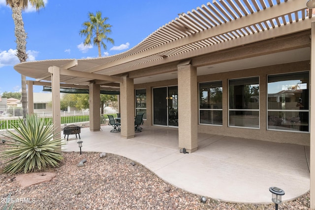 view of patio featuring a pergola