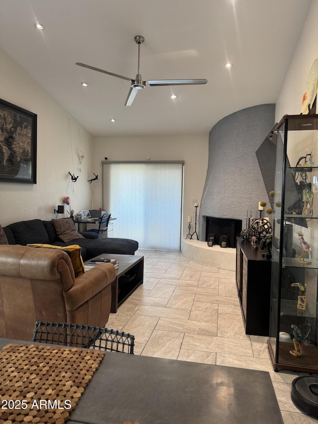 living area featuring recessed lighting and ceiling fan